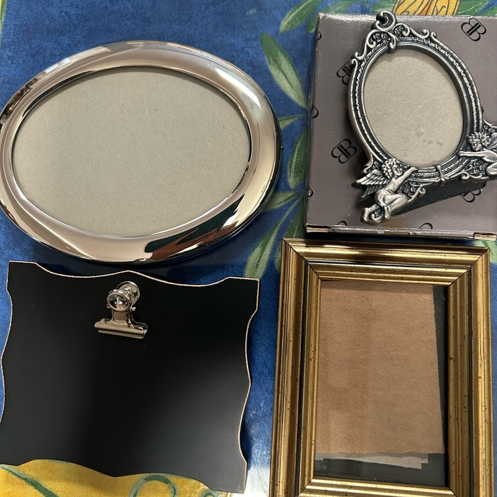 Four Small Photo Frames